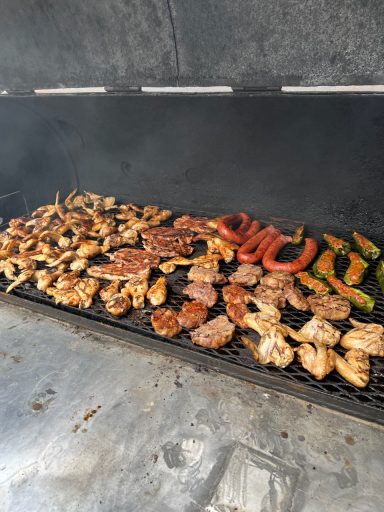 Grilled chicken, sausage, chops